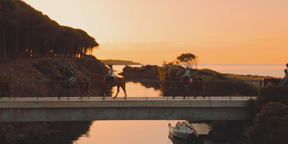 Sunset horseback ride on the beach of Orosei